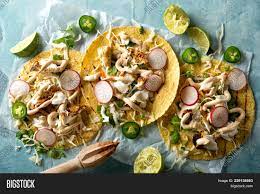 Mash avocado in a bowl; Delicious Tacos Image Photo Free Trial Bigstock