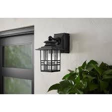 Indoor outlets can last decades without needing a replacement, whereas outdoor plugs tend to go bad much sooner due to prolonged condensation. Mission Style Black With Bronze Highlight Outdoor Wall Lantern With Built In Electrical Outlet Gfci 30264 The Fixture Place