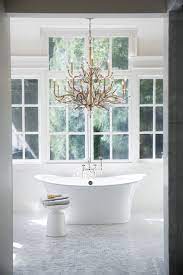 Create A Private Oasis Like No Other Bathroom Lighting Luxurious Master Bathroom Chandelier Lighting
