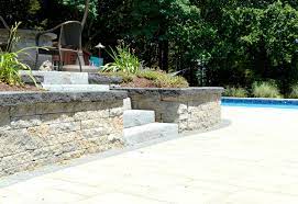 At around half the cost of other options. building a retaining wall can be extremely expensive, but it needs to be right first time. Retaining Wall Options Natural Stone Concrete Veneer Or Painted Plaster Landworx Of Ny Landscape Design And Build Goshen Ny Hudson Valley Landscaping Company