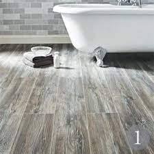 Bathroom floors are usually clad with tiles because tiles are very functional, durable, easy to wash and maintain and they look cool. The Latest Bathroom Flooring Options Real Homes Bathroom Flooring Options Wood Floor Bathroom Laminate Flooring Bathroom