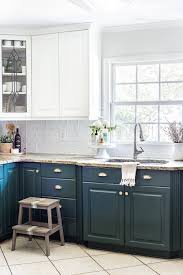 Of course, it's not the same as completely new cabinets, but this is a great, inexpensive way to update ugly oak cabinets on a budget. Green Kitchen Cabinet Update Bless Er House