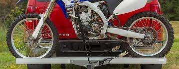 They're carriers that sit on the back of your vehicle and carry your motorcycle, much like a bike rack. 10 Best Motorcycle Hitch Carriers Review In 2020