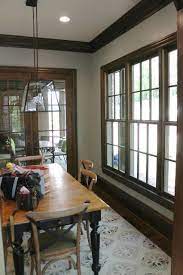 Check spelling or type a new query. Lighter Silver Gray Blue Sherwin Williams 7059 Unusual Gray Walls With Dark Wood Trim And Dark Wood Trim White Living Room Paint Colors Dark Dining Room