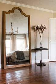 11 Simple And Stunning Ways To Make A Small Bedroom Look Bigger Flourishmentary Small Bedroom Inspiration Bedroom Furniture Placement Large Floor Mirror