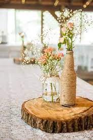 Wood slices for wedding centerpieces. 10 Wood Slab Centerpiece Ideas Wood Slab Centerpiece Wedding Decorations Wedding Centerpieces