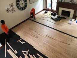With plywood engineered products, hardwood veneer layers are stacked on one another, with the grain of the adjacent layers oriented perpendicular to each other. Weathered Grey Stained Hardwoods Liberty Mo Hardwood Floor Refinishing