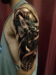 Black And Grey Wolf Tattoo Black And Grey Wolf Howling At The Moon Tattoo By Jordyngrinetattoo 22caliber Tattto Studio Hilliard Columbus Oh Wolf And Moon Tattoo Moon Tattoo Tattoos