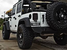 Black And White Rockstar Rims Jeep Wrangler With Rockstar Wheels Jeep Wrangler White Jeep Jeep Cars