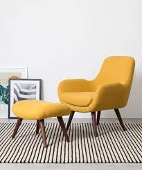 Mustard yellow on a chair can still make a bold statement, but it's not as loud or overwhelming as if it were on a couch. Moby Accent Armchair Yolk Yellow Made Com