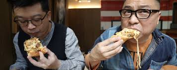 Pizza with abalone sauce, shiitake mushrooms and cheese taste test: Buddha  Jumps Over the Wall Lunar New Year special launched by Pizza Hut