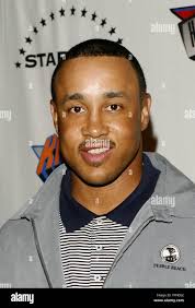 John Starks arrives for pictures before a game between Hollywood and Hip  Hop for the first annual 4Chosen celebrity basketball game at Basketball  City