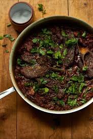Mediterranean Braised Lamb Shoulder Chops Tender Rich Meat Is Smothered With A Rich Sauce Made With Toma Braised Lamb Shoulder Braised Lamb Braised Lamb Chops