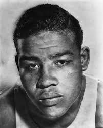 From the 1927 Phillips High School yearbook (Birmingham, Alabama), in the  middle is a young Jimmy "Kid" Lott in his junior year. While still in  school, he trained in wrestling and boxing,