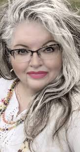 What hairstyle suits a 58-year-old woman with curly hair and a round face?