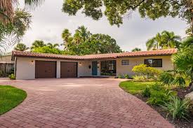 According to bloomberg news, you will make back only about 57 percent of your investment in a new garage when you sell your house. Photo 1 Of 9605 In Exterior Photos From Before After A Dated Florida Ranch Gets A Complete Makeover For 311k Dwell