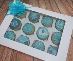 A tray of cupcakes topped with these light blue and white fondant elephant toppers would look adorable at a boy's baby shower. Baby Shower Cakes Quality Cake Company Tamworth