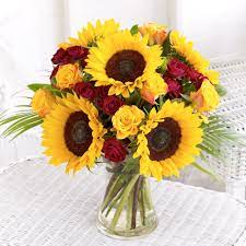 Sunflowers And Deep Red Roses Are An Elegant Combination Red Rose Centerpiece Wedding Red Rose Wedding Sunflower Centerpieces