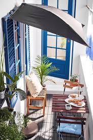 Small Patio Ikea Can Help In A Big Way With These Space Saving Furniture Picks Small Patio Wooden Outdoor Furniture Outdoor Living Areas