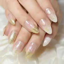 This set of nails has to be one of my favorites of all time. Wholesale For Nail Sets Spirit Fairy Stiletto Nails 24 Full Set Of Nails Clear Fake Nails Natural Look Glitter Decorated Artificial Nails