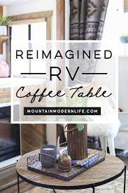 When folded or open, this tabletop includes two cup holders and a magazine/book holder in the bottom. Reimagined Rv Coffee Table Mountainmodernlife Com