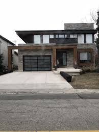 Course stone & sleek metal roofing. 50 Rustic Contemporary Lake House Design With Privileged Views Of Lake Minnetonka Texasls Org Exterior House Colors Contemporary House Design House Exterior
