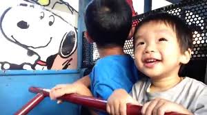 Baby Riding Camp Bus at Knott's Berry Farm