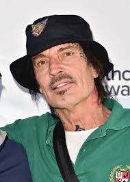 80s rock 'n' roll legend bizarrely plays drums with lamb bones