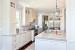 Polished Nickel Hardware On White Cabinets