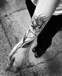 The beautiful orange hue is reminiscent of a flower's pollen and makes a focal point of the skull. 99 Gorgeous Unisex Rose Tattoo Designs That Redefine Sexiness