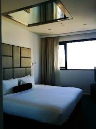 Bedroom With A Mirror On The Ceiling Picture Of Meriton Suites Kent Street Sydney Tripadvisor