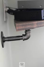 Choosing a corner tv mount may seem like a simple and straightforward task. Build This Clever Diy Corner Shelf For Under Your Mounted Tv Today The Diy Nuts