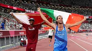 Gianmarco tamberi and mutaz essa barshim react after winning the gold medal in the men's high jump. V2 2cysbdjfqzm