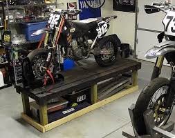 See more ideas about motorcycle lift table, lift table, bike lift. Elevated Motorcycle Workstation By Punisher Homemade Elevated Motorcycle Workstation Constructed From Wood Motorcycle Garage Motorcycle Motorcycle Workshop