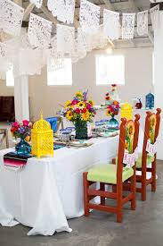 Use a traditional serape for your table runner.; How To Style A Mexican Themed Table Bespoke Bride Wedding Blog