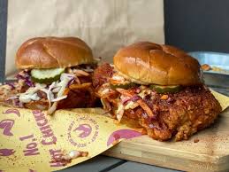 While your chicken is frying, whisk together olive oil, cayenne, brown sugar, paprika, chili powder and garlic powder. Atlanta Restaurants Where To Find Nashville Hot Chicken