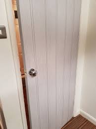 Door Wrapped In Arthouse Tongue And Groove Wood Panel 3d Effect Wall Wallpaper 694300 Door Wraps Wall Wallpaper Doors Interior