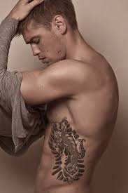 If you want a tattoo on your rib cage, you will get it. Awesome Rib Cage Tattoos For Men