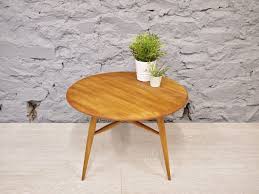 It's made from solid elm, with stunning grain patterns on the top. Ercol Coffee Table Vintage Ercol Drop Leaf Round Coffee Etsy Ercol Coffee Table Coffee Table Vintage Round Coffee Table