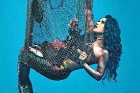 Alissa White-Gluz Poses in PETA Ad to Protest Fish Consumption