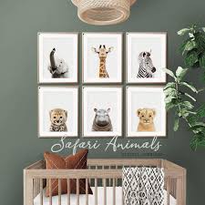 A neutral crib is warmed by cheerful giraffe bedding, which includes a baby quilt. Safari Baby Animal Prints Nursery Animals Print Set Of 6 Safari Animal Nursery Prints Safari Nursery Art Jungle Nursery Wall Decor Printable In 2021 Baby Boy Animal Nursery Baby Safari Nursery