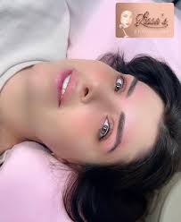 A lash lift and tint: is a semi-permanent beauty treatment that enhances  natural lashes by curling and darkening them. It gives lashes a fuller and  more defined look without the need for