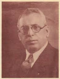 Giuseppe Minniti Outside his Home, Newel Street, Footscray, May 1955  Summary Digital image copied from black and white photograph showing  Giuseppe (John) Minniti standing outside his home in Newel Street Footscray  in