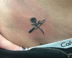 Stick And Poke Rose And Dagger Tattoo Neck Tattoo Rose And Dagger Tattoo Tattoos