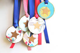 8 olympic crafts for kids, including olympic torches and rings, plus 4 paper crafts for the london 2012 summer olympic games. American Crafts Studio Blog Inspire Friendly Competition With Homemade Medals