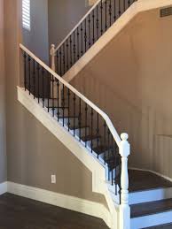 Black And White Stair Railing White Railing With Black Spindles Wood Stairs With White Risers White Stair Risers White Staircase Stair Railing Makeover