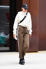 Her black pair of biker shorts styled with a simple white tee and a denim jacket thrown over. Gigi Hadid Model Style Gigi Hadid S Sexiest Looks