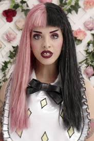 Black hair with light pink bangs. Melanie Martinez S Hairstyles Hair Colors Steal Her Style