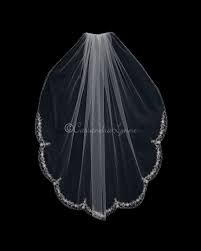 Girly golden sequins and delicate tulle. Scalloped 45 Inch Veil With Rose Gold Accents Cassandra Lynne