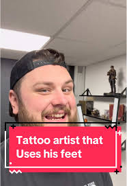 Guy Does Tattoo with Feet